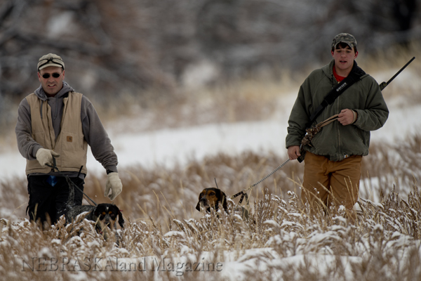 Deric Anderson, at left, and Holden Bruce look for mountain lion tracks.