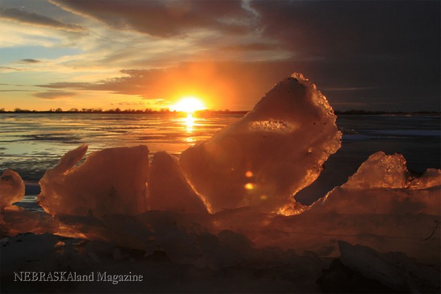 The colors of a great sunset really reflect off ice for a great photo.