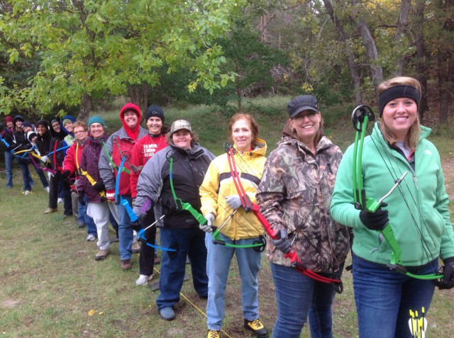 Teaching archery to a gaggle of gals at the Becoming an Outdoors-Woman Program 