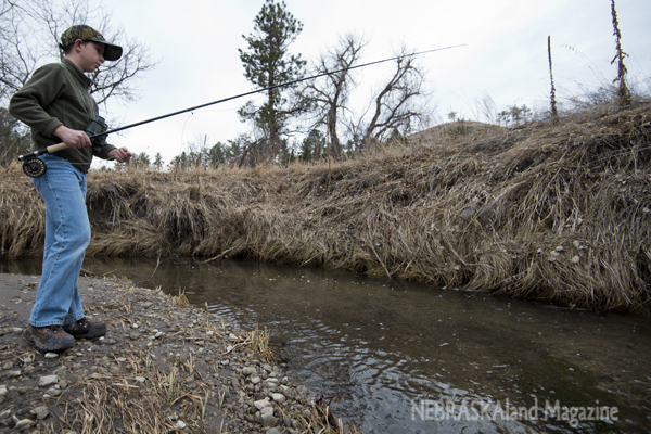 Sawyer hunts for trout along Soldier Creek.