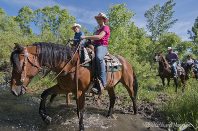 Riders cross Soldier Creek at Fort Robinson State Park during last year's Ride the Ridge. (NEBRASKAland/Justin Haag)