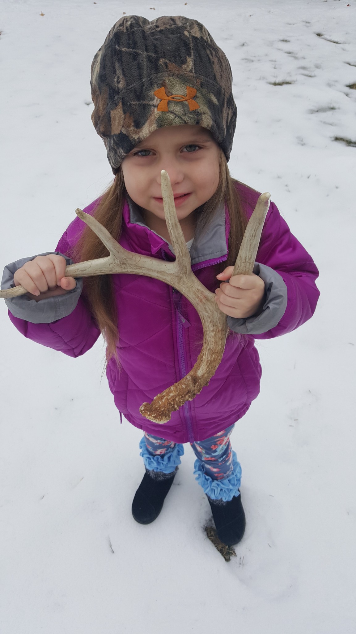 Maddie Pierce with Shed Antler. Photo by Greg Wagner.