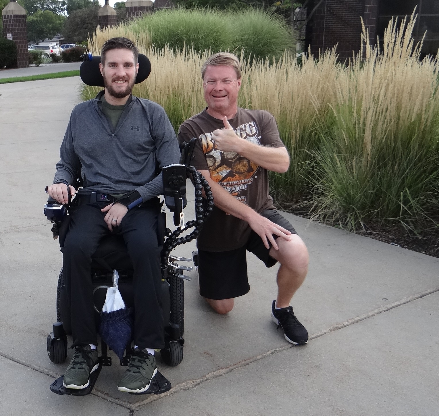 Tyler and your blogger pose for a photo on the campus of the Madonna Rehabilitation Hospital in Lincoln, NE. Photo by Emma Nichols.