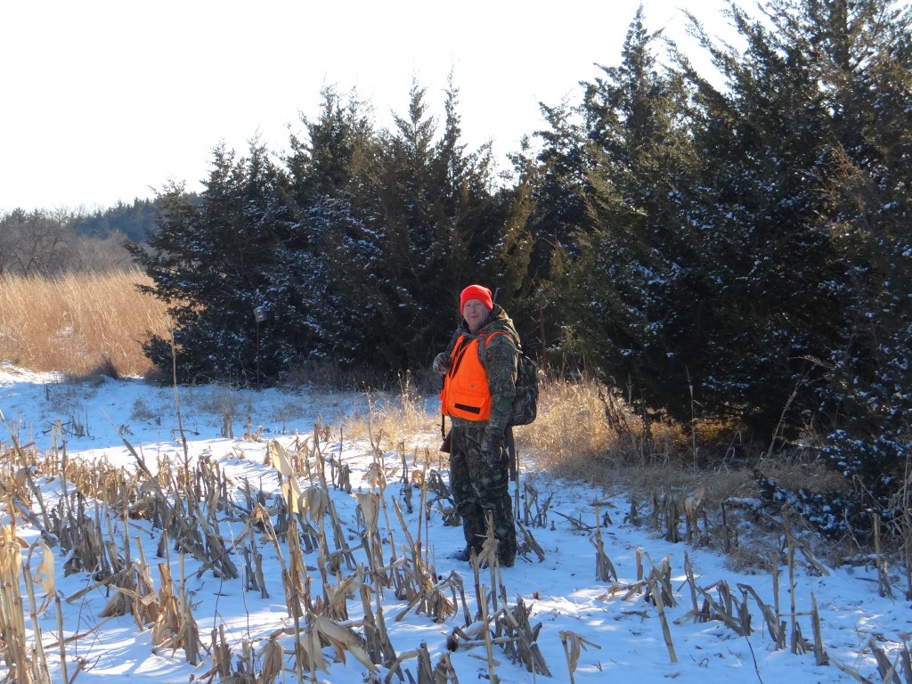 Greg Wagner's cousin, Mark Hintz, stops for a quick photo on his family farm before heading to his blind dureing a recent Nebraska firearm deer hunting season. Photo by Greg Wagner/Nebraska Game and Parks Commission.