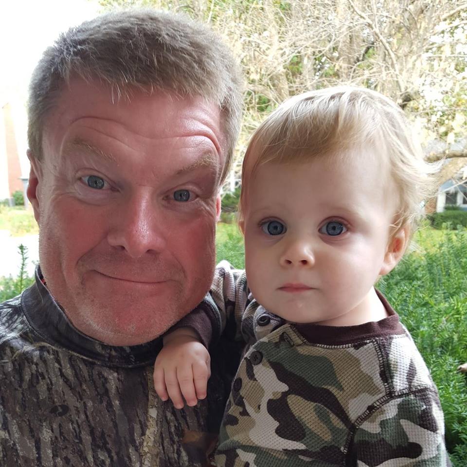 My grandson, Jackson Edward Wagner, and me pose outdoors with clad our camouflage shirts. Photo by Polly Wagner.