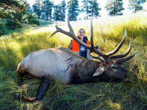 Hannah Helmer of Seward and her Nebraska state-record non-typical American elk that scored 430 6/8 on the Boone and Crockett scoring system. The 14-year-old harvested the bull near Crawford, Nebraska, on September 24, 2016.