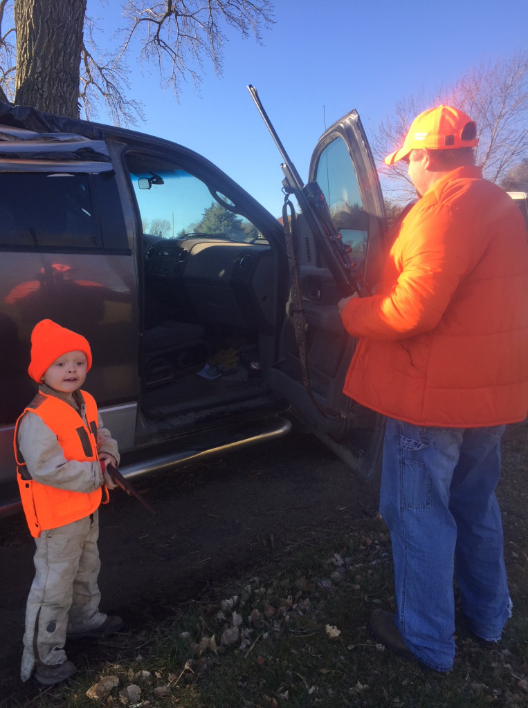 Kanyon, age 5, headed out to look for a deer with Dad and Kyler