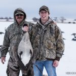 Sawyer Haag with first goose and Larry Olson