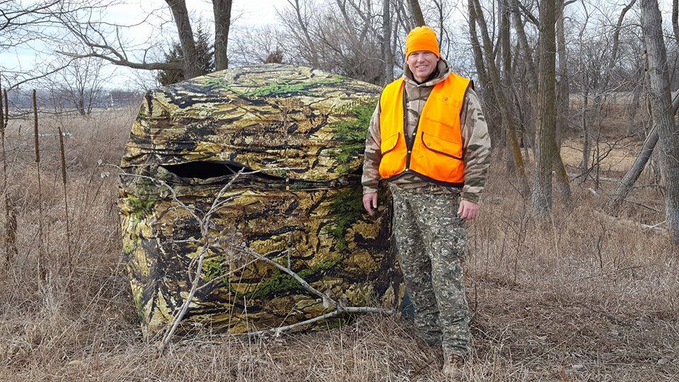 Nebraska Conservation Officer Rich Berggren poses for a photo before entering his muzzleloader deer hunting season blind in his off time.