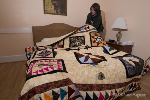 Becky Serres with quilt at Fort Robinson State Park