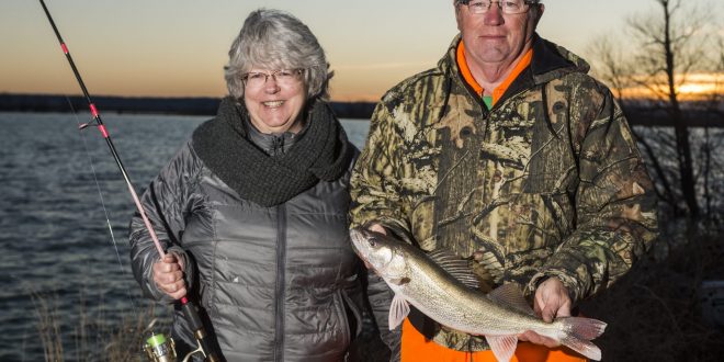 Anglers with walleye