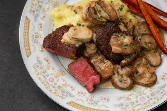 Venison loin with whisky and mushroom cream sauce.