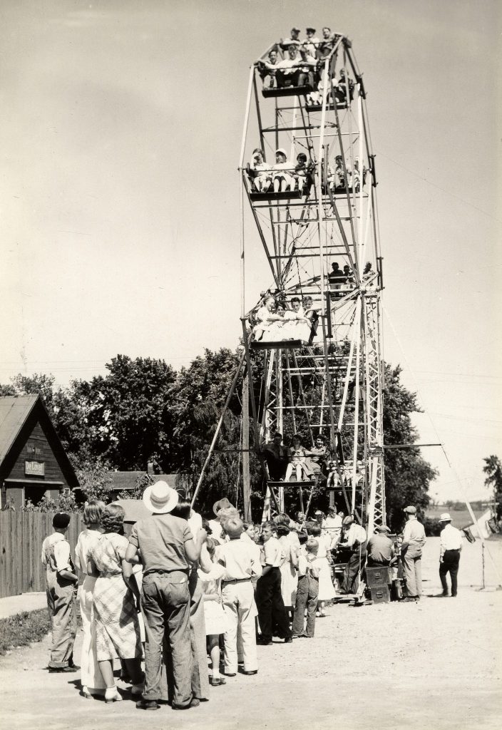 A ferris wheel at a carnival in the early 1900s in Nebraska.