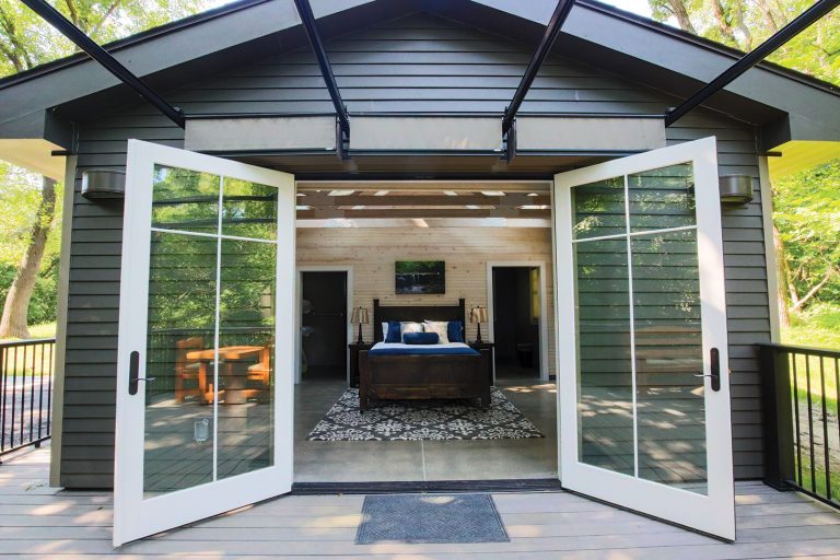 Glamping cabin at Platte River State Park with French doors open.