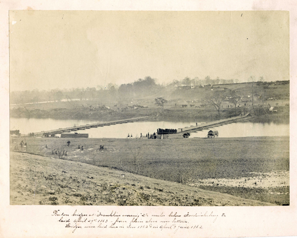 A vintage photo of a bridge over a river