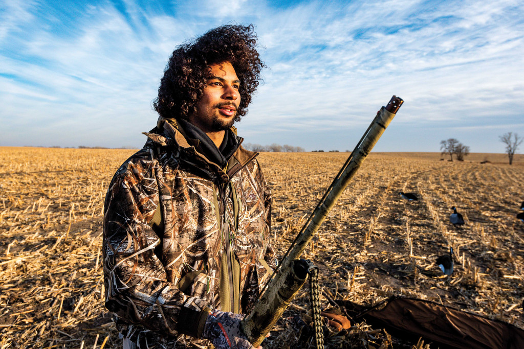 man hunting in corn field