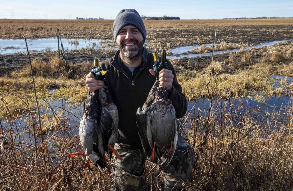 Jeff Kurrus holds four mallards harvested in Nebraska's Rainwater Basin.