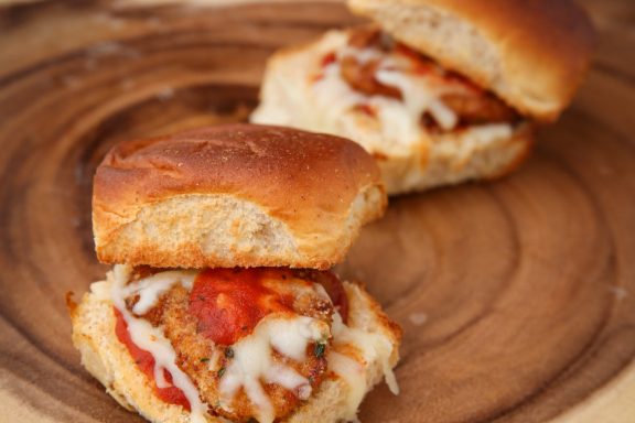 Deer testicle coated in Italian breadcrumbs and fried, and served in a slider with mozzarella cheese and marinara sauce.