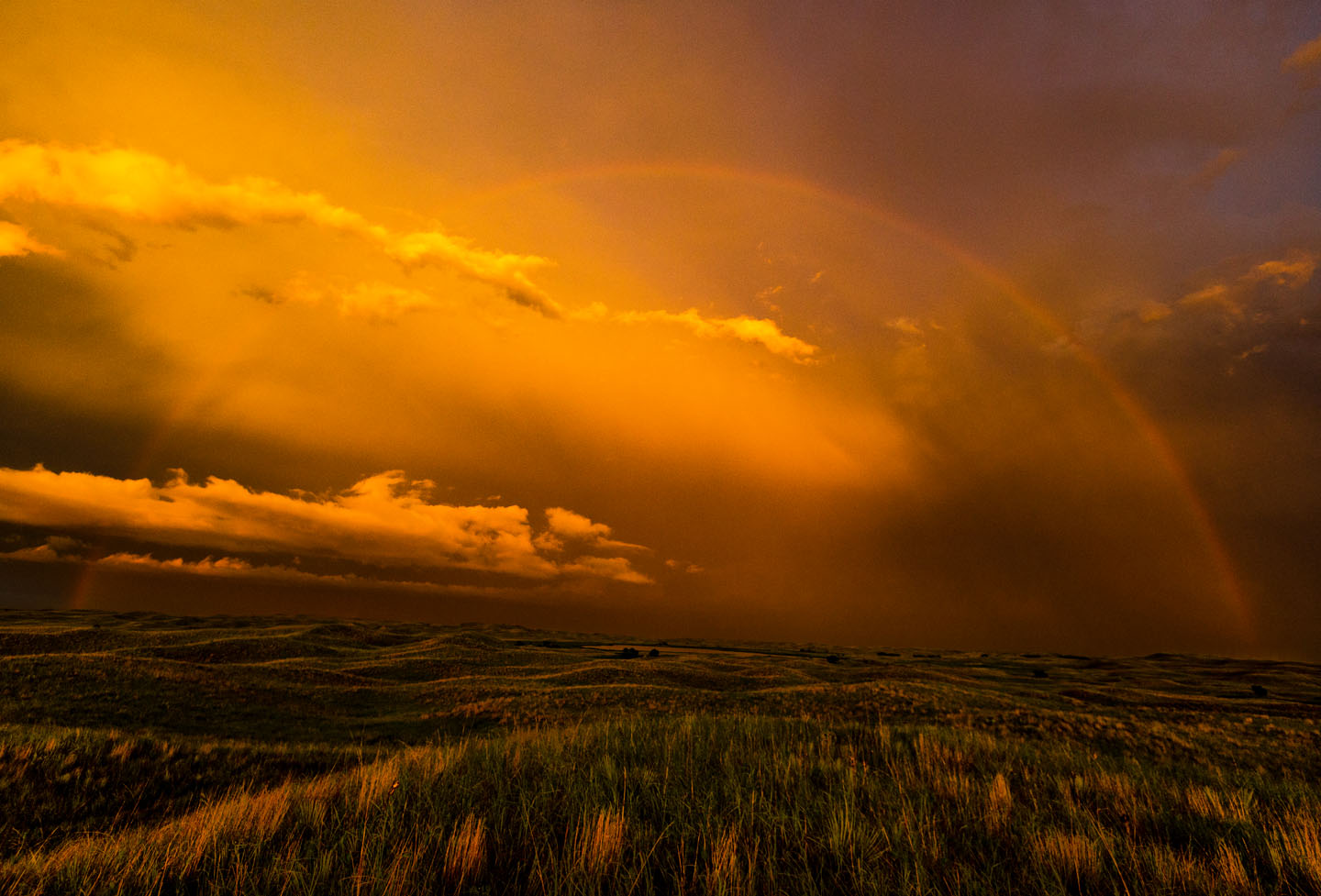 storm photography golden hour rainbow