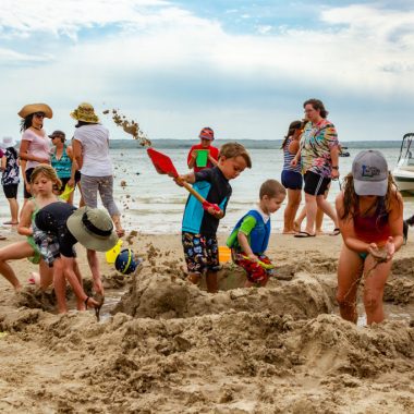 Children playing in sand at Lake McConaughy