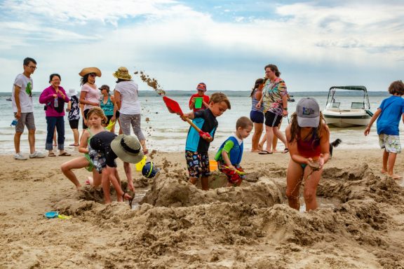 Children playing in sand at Lake McConaughy