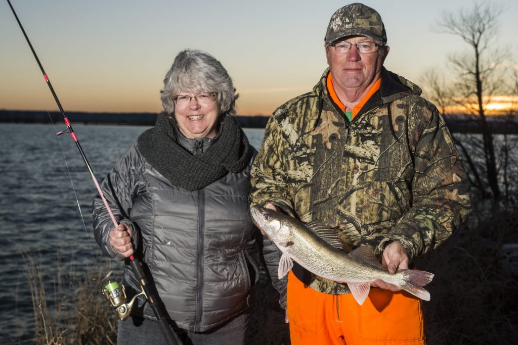 Anglers with walleye