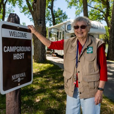 Eleanor Shimek by campground host sign