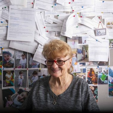 CJ Zajicek poses in her office where she works as the Parks Reservation Call Center for Nebraska Game and Parks.