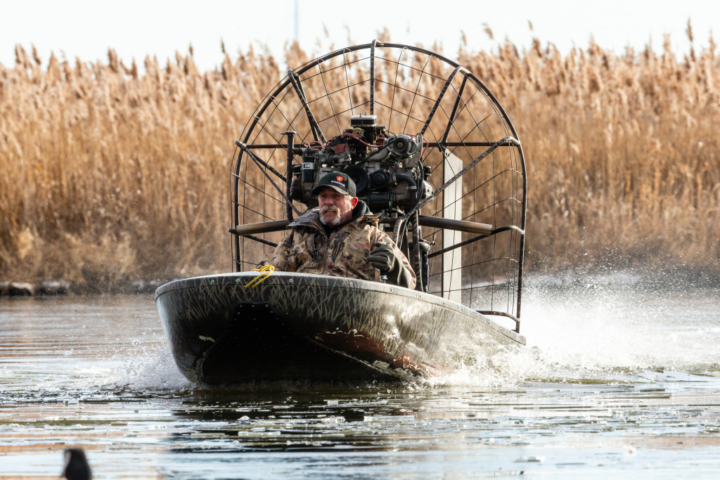 A homemade ice-breaking airboat is employed during a frosty morning goose hunt.