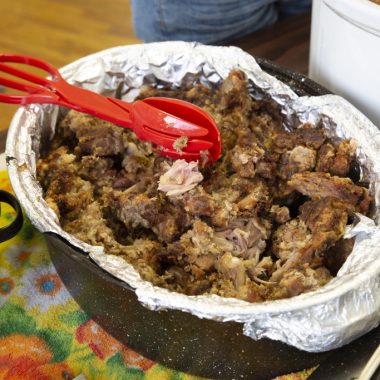 A pot of fried and steamed snapping turtle pieces.