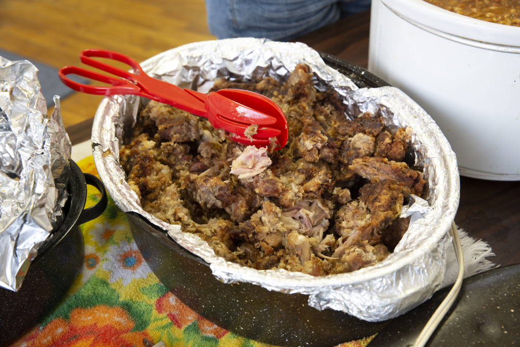 A pot of fried and steamed snapping turtle pieces.