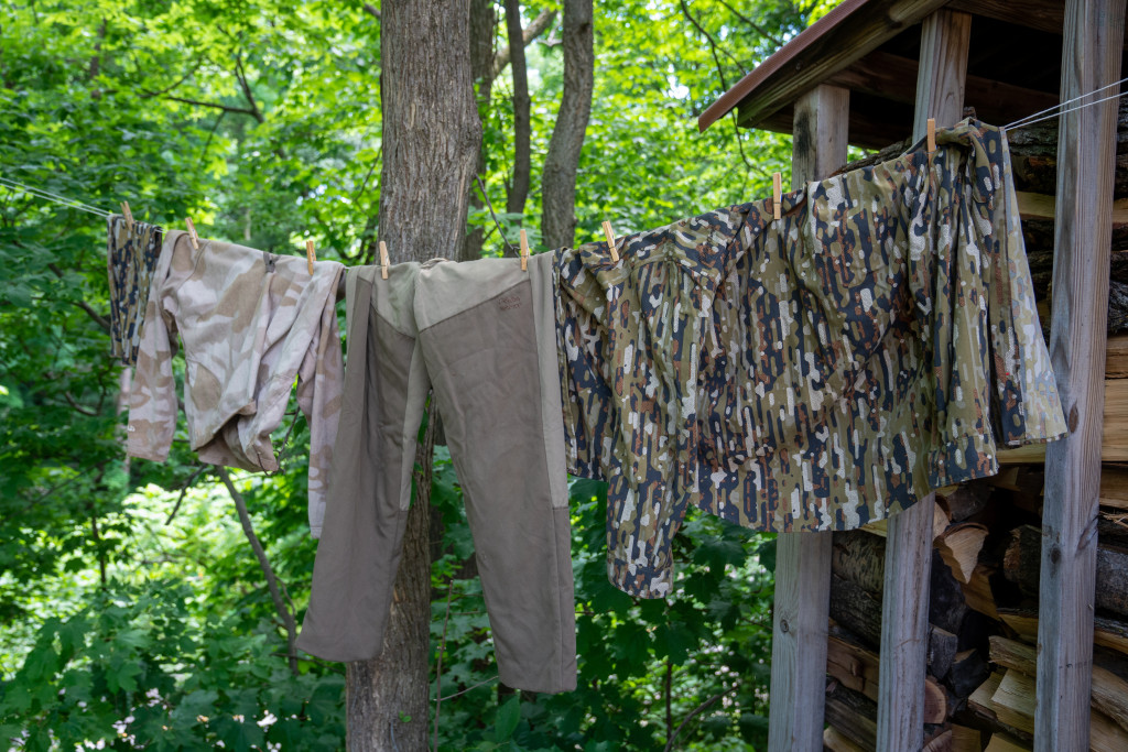 hunting clothes hanging on a line to air out