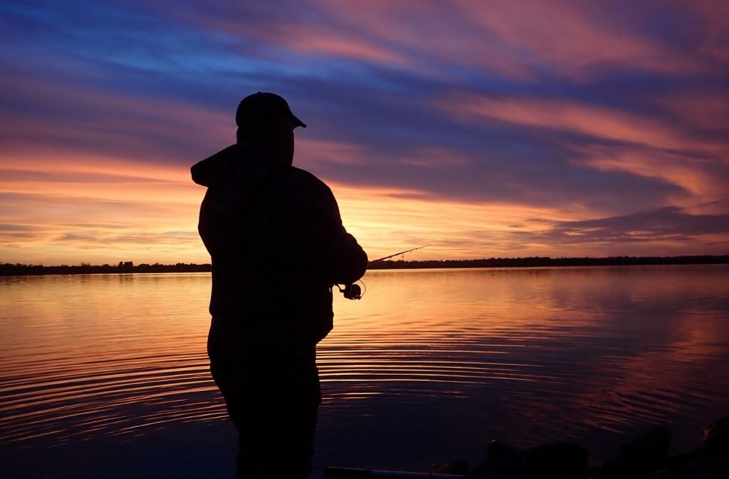 angler silhouette against the sunset