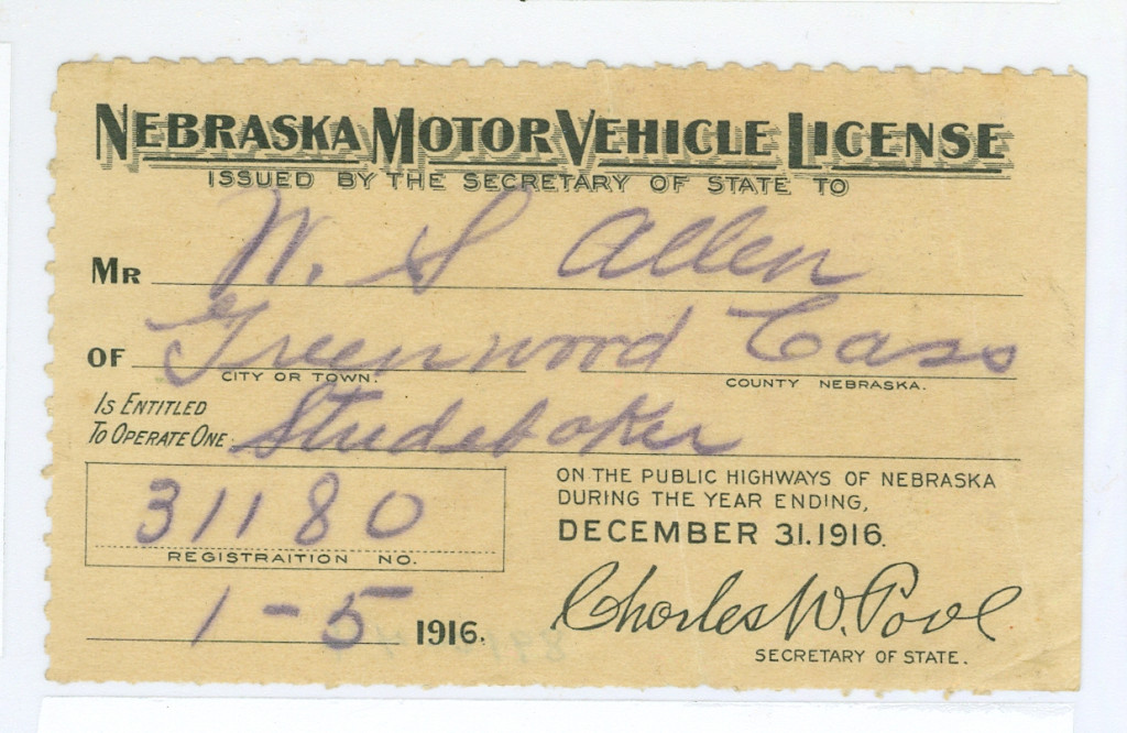 a handwritten vehicle license 