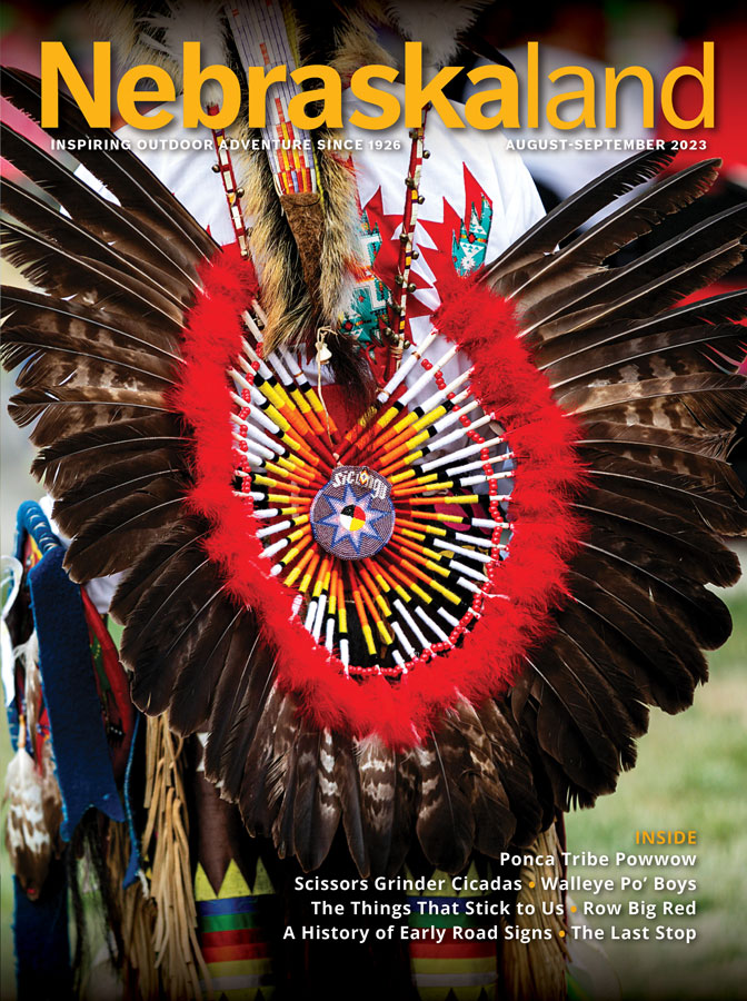 August-September 2023 Nebraskaland Magazine cover featuring a dancer at the Ponca Powwow