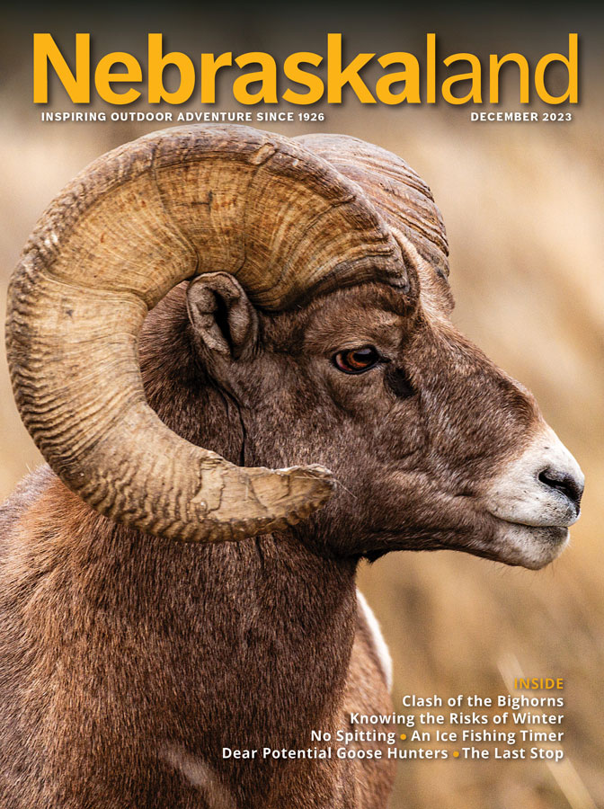 December 2023 Nebraskaland Magazine cover featuring a close-up of a bighorn sheep ram.