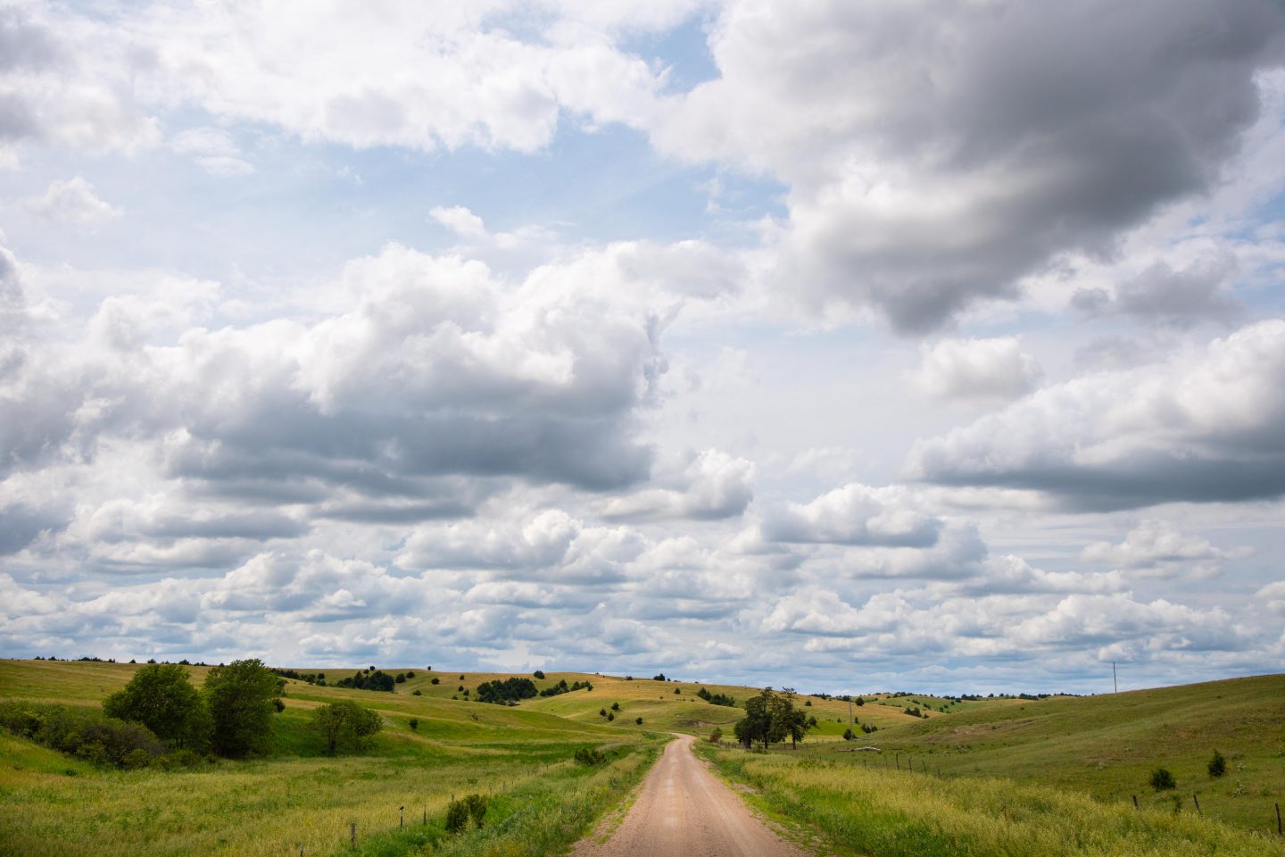 Clouds over a country road.