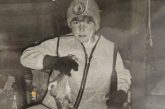 Vintage photo of a boy with a harvested rabbit