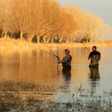 Anglers fishing at Lake Maloney SRA in early spring.