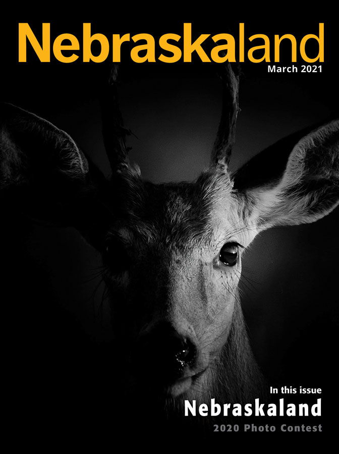 March 2021 Nebraskaland issue featuring the 2020 Photo Contest winner image of a deer head.