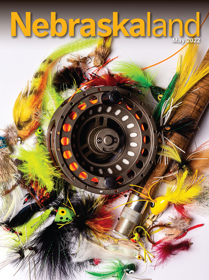 May 2022 Nebraskaland cover with fly fishing rod and flies