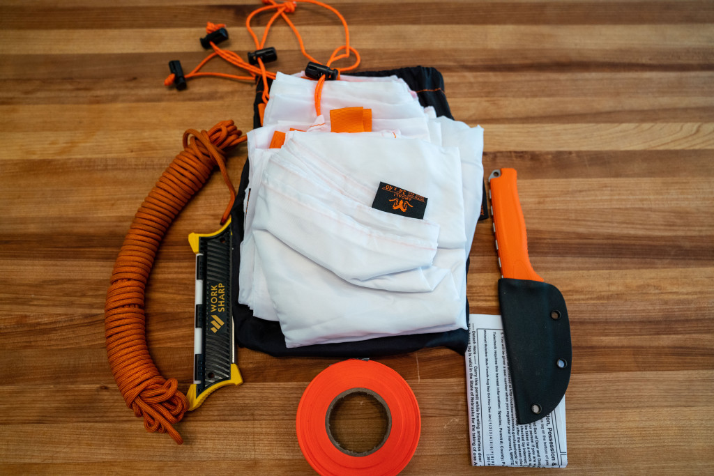 A field dressing kit laid out on a table