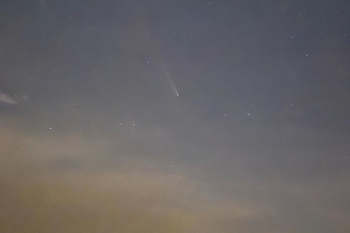 Tsuchinshan-ATLAS comet in the western sky just after sunset.