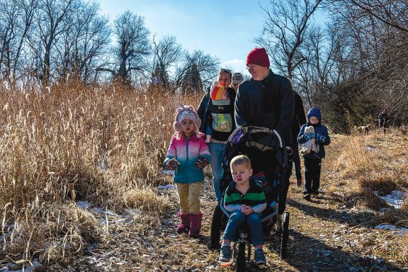 A family participating in a First Day Hike.