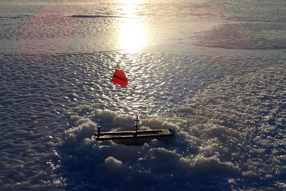 Ice fishing tip-up.