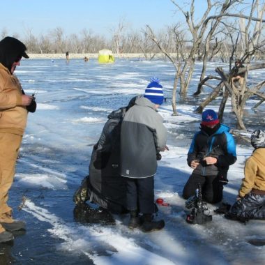 Anglers on the ice fishing.