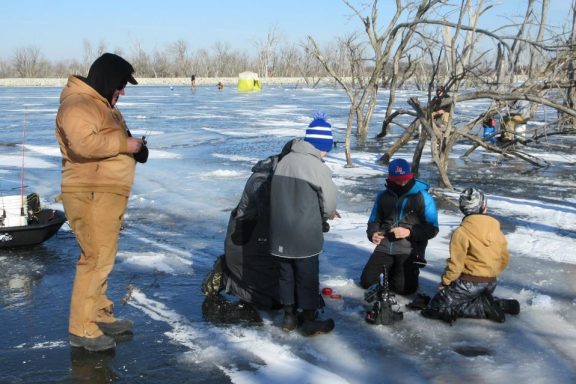 Anglers on the ice fishing.