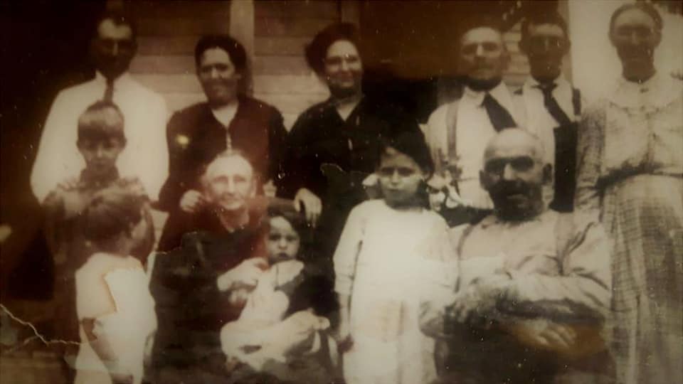 A family photo from 1910 in front of a home in Nebraska.