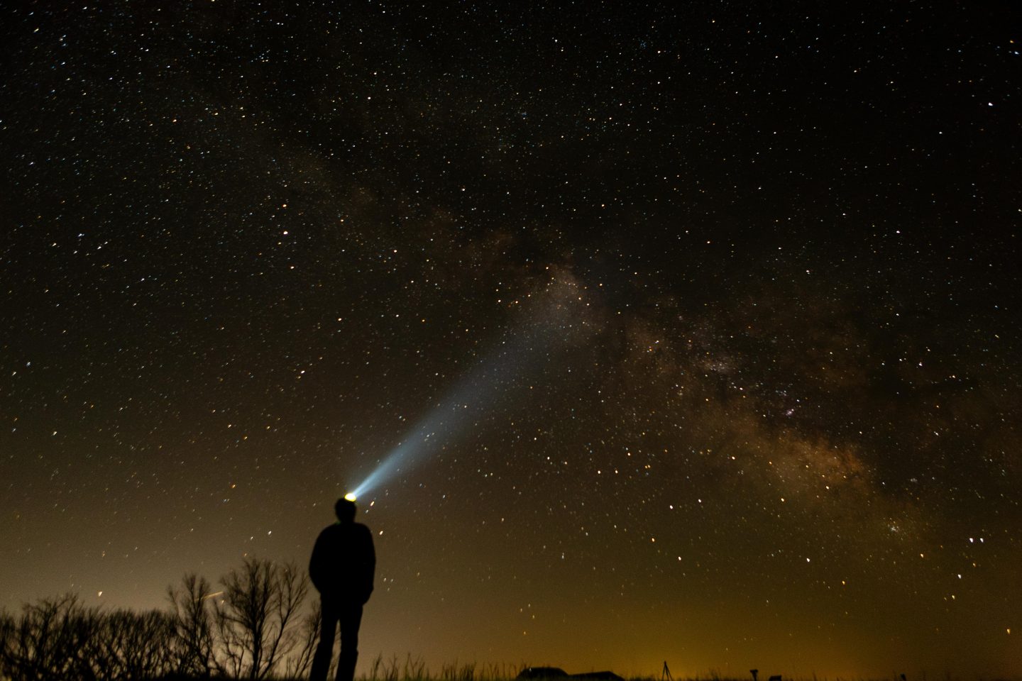 A man looking up at the Milky Way.