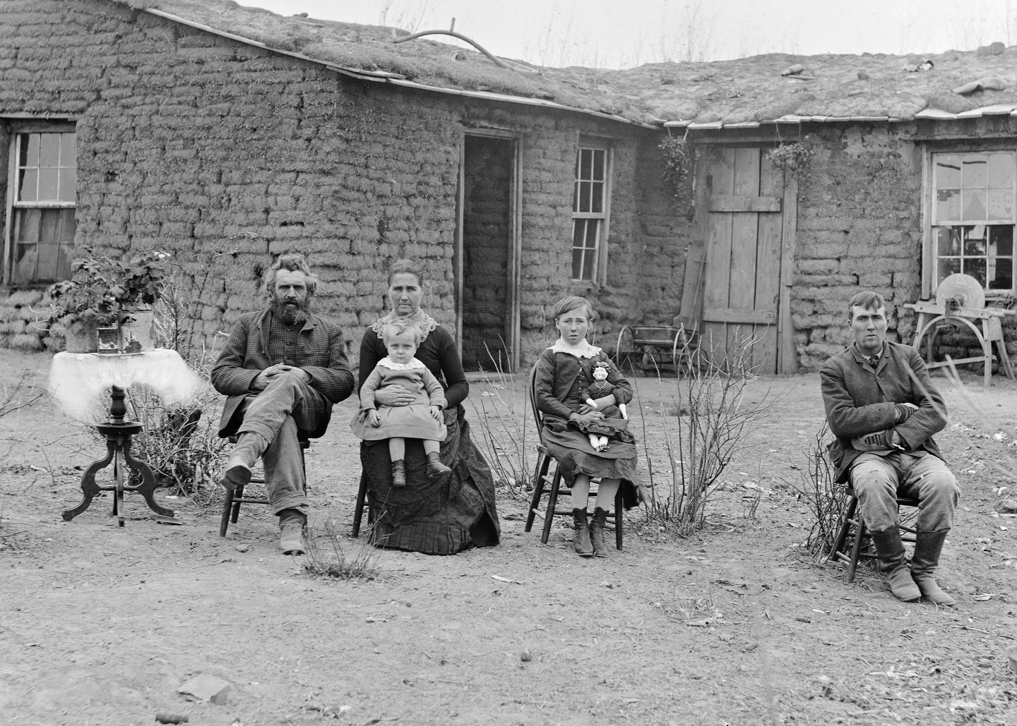 Even a nice end table was worth showing off. George Copsey and family, Westerville, Custer County, 1886. Photo by Solomon D. Butcher. NSHS RG2608-0-1008